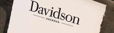 Paper with the "Davidson Journal" wordmark printed on it atop a letterpress