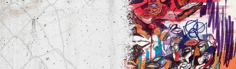 Art depicting colorful faces and a broken chain link fence