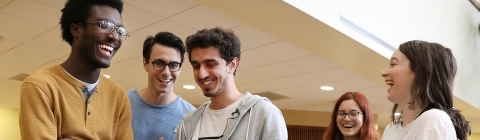Students Laughing in Commons during cooking event