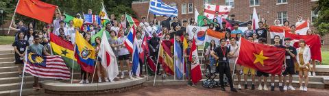 International Students Holding Flags from Countries of Origin