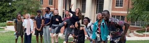 Davidson Alvarez Scholars smiling outside College Union