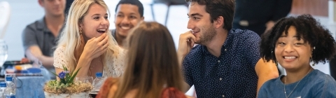 Belk Scholars sitting at a table during sendoff event