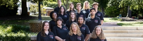 College advising corps employees gather for a group shot outside