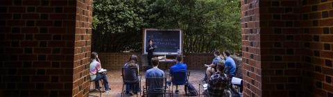 Chinese Studies Outdoor Class with Mandarin Written on Chalk Board