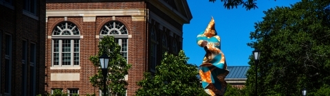 Shonibare Statue with blue sky background