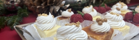 Plate of desserts with pinecones in background