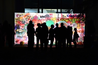 Students participate in a Berlin Wall Simulation