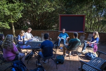 Prof. Keyne Cheshire leads class outside