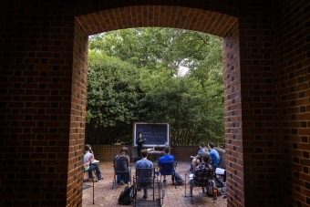 Chinese Studies Outdoor Class with Mandarin Written on Chalk Board