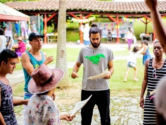 Santiago Navia '17 in Colombia with other people gathered around him