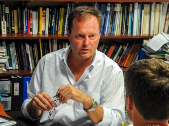 Prof. Menkhaus and student meet in his office