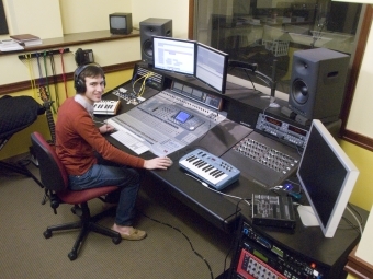 Student Using Electronic Music Equipment