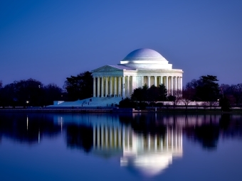 Jefferson Memorial in Washintong D.C. through the water and trees