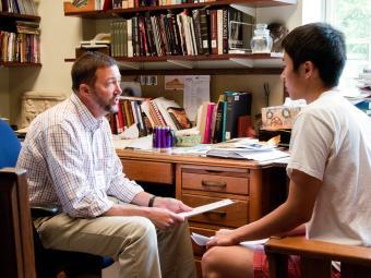 Prof. Peter Krentz meets with student in his office