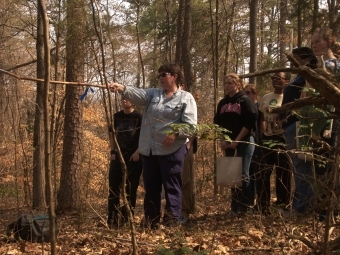 Prof. Pat Peroni leads students in field research