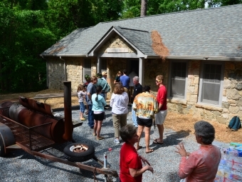 Students and faculty walk into event held at Erwin Lodge