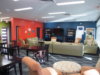 Colorful walls, couches, seats and books