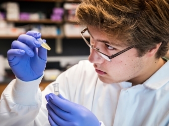 Student with test tube