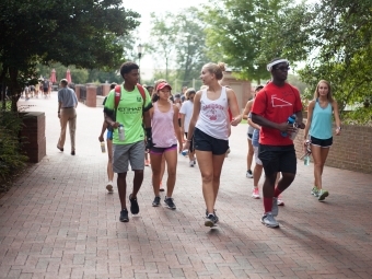 Group of student walk on campus