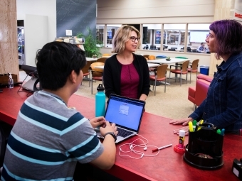 Sundi Richard and Lisa Forrest Chat with Library Student Worker