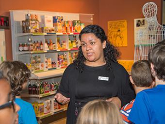 Marlene Arellano ’17 teaches students in the Levine Museum’s History ACTIVE summer program.