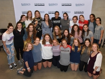 Students pose with Olympic swimmers