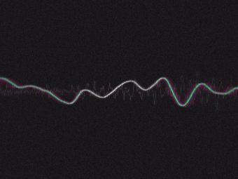Soundwaves on a black background and a small q in the right corner of the image