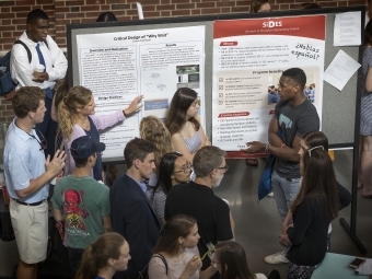 Verna Case Symposium Students Presenting and Viewing Posters