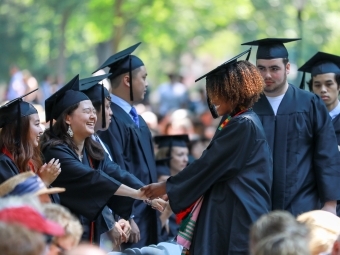 Students shake hands