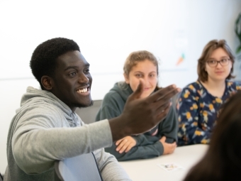 Jeriel Adarquah-Yiadom (l), a sophomore defensive end for Davidson’s football team, says the Silicon Valley program has empowered him to explore his interest in software engineering.