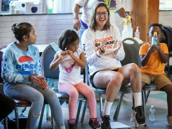 Student leaders at Freedom Schools laugh with students