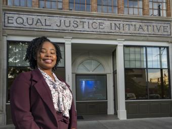 Kiara Boone '11 outside of the Equal Justice Initiative Building