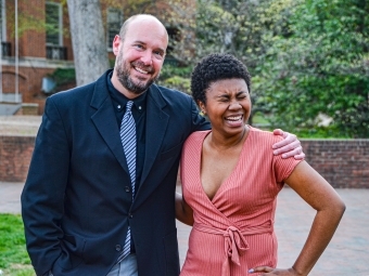 Kaya Carter laughing with Jason Ockert outdoors