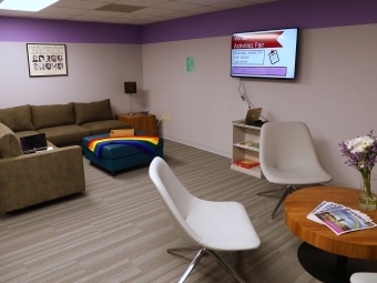 Photo of Lavender Lounge with purple walls and modern furniture