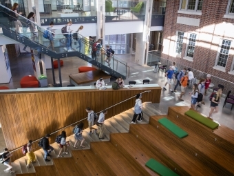 Students in Walking inside the Wall building