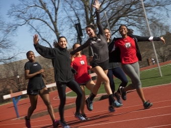 Students running on the track