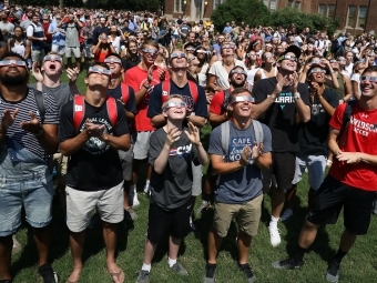 Davidson community on the green during the eclipse
