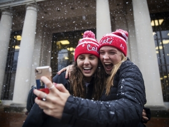 Students take a selfie in the snow