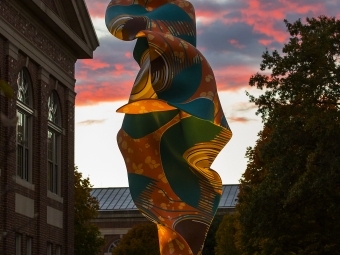 Wind Sculpture (SG) I in front of Wall Building