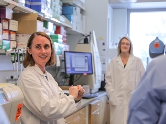 Sallie Permar with colleague in lab
