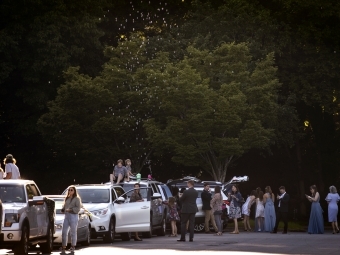 Guests lined up outside their cars