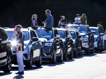Cars of friends and family lined up