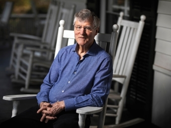 Bill Ferris sitting in a rocking chair