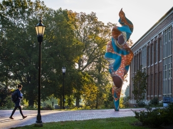 Campus Beauty Student Walking Past Shonibare Sculpture
