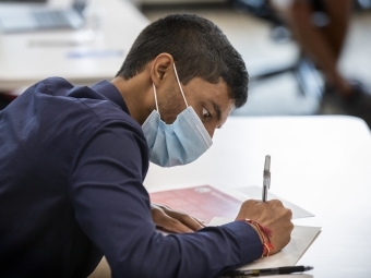 Student Signs Honor Code with Mask On