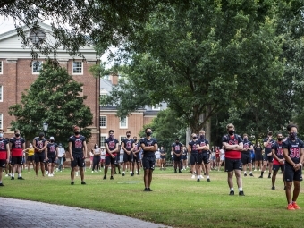 Social Justice Event - Football Team on the Green