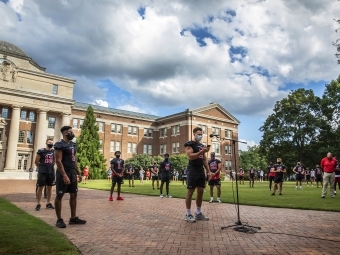 Social Justice Event - Football Team on the Green