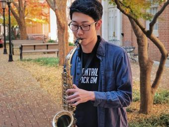 Student playing saxophone member of jazz ensemble