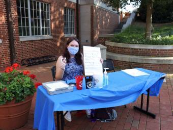 Student at a voter registration table