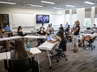 Cindy Hauser Leads Class of Students with Social Distance Seating Chart and Mask Wearing